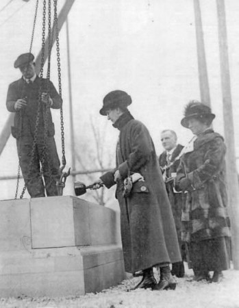 Henrietta Godber lays a foundation stone for the carillon tower